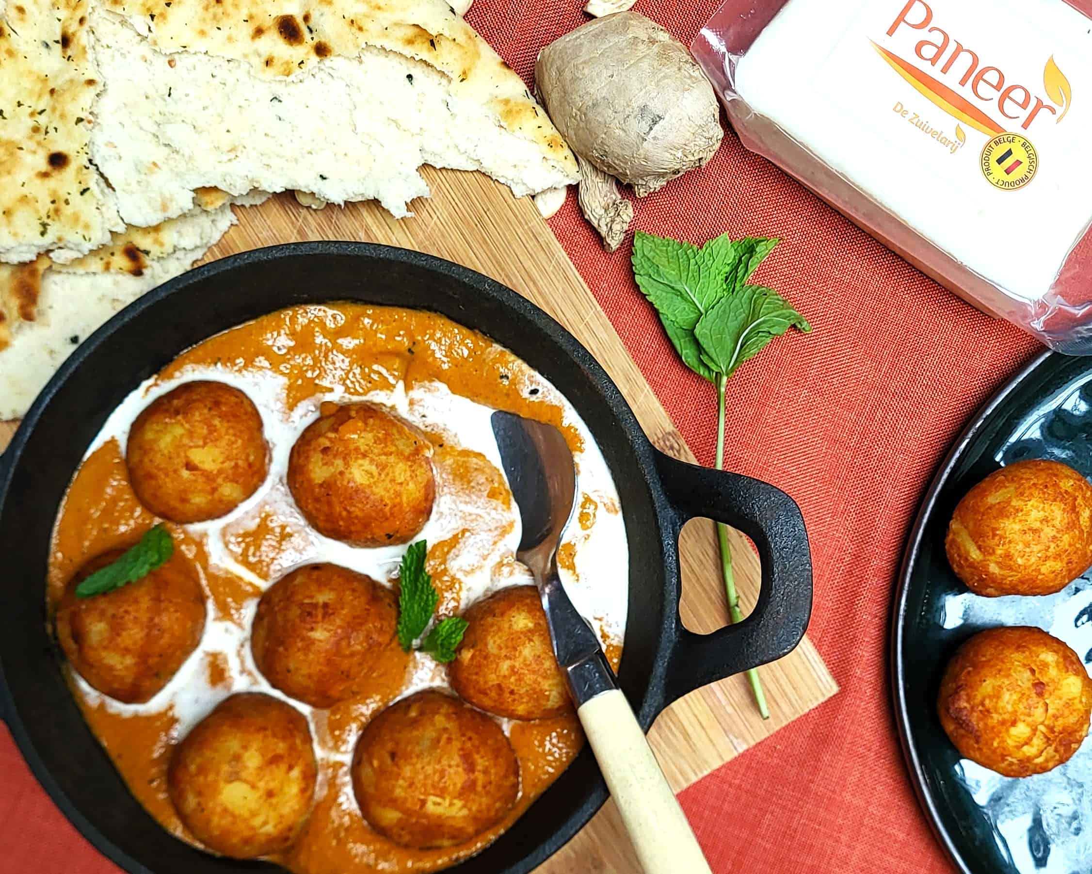 Malai Kofta met romige saus en krokante balletjes, perfect voor een smakelijk vegetarisch gerecht.